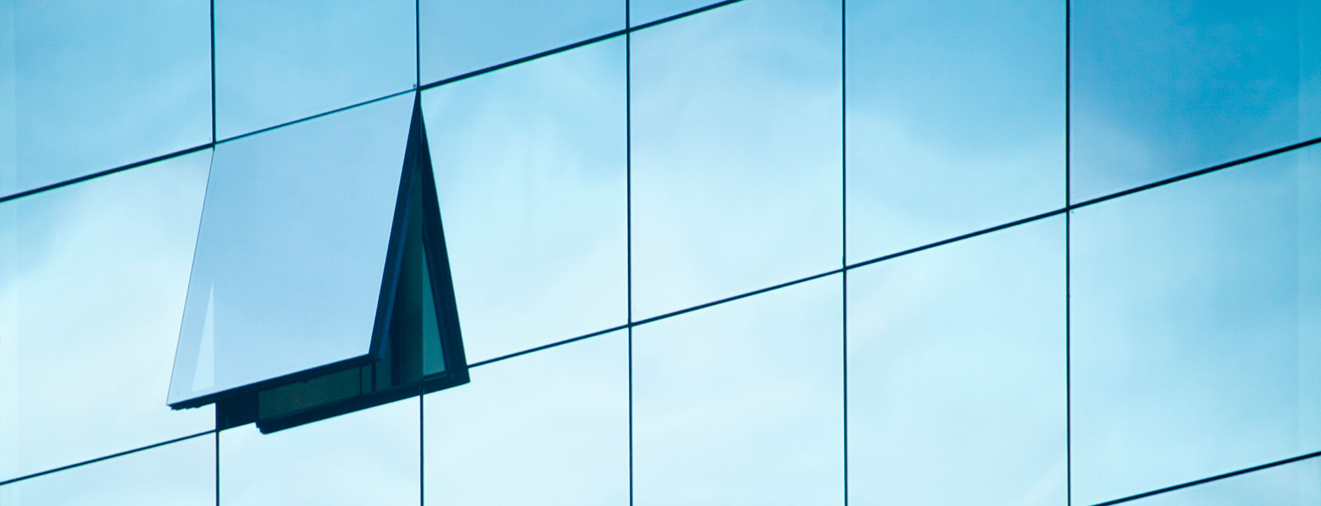 Four-sided structural glazed framing system